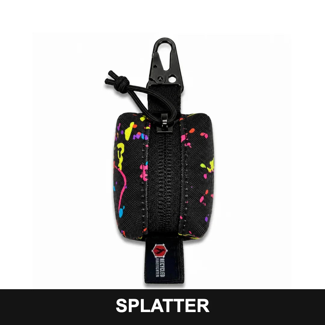 Recycled Firefighter Hot Shot Scout Keychain Pouch in Splatter, featuring a distinctive pattern, compact construction, and secure storage for small everyday essentials.