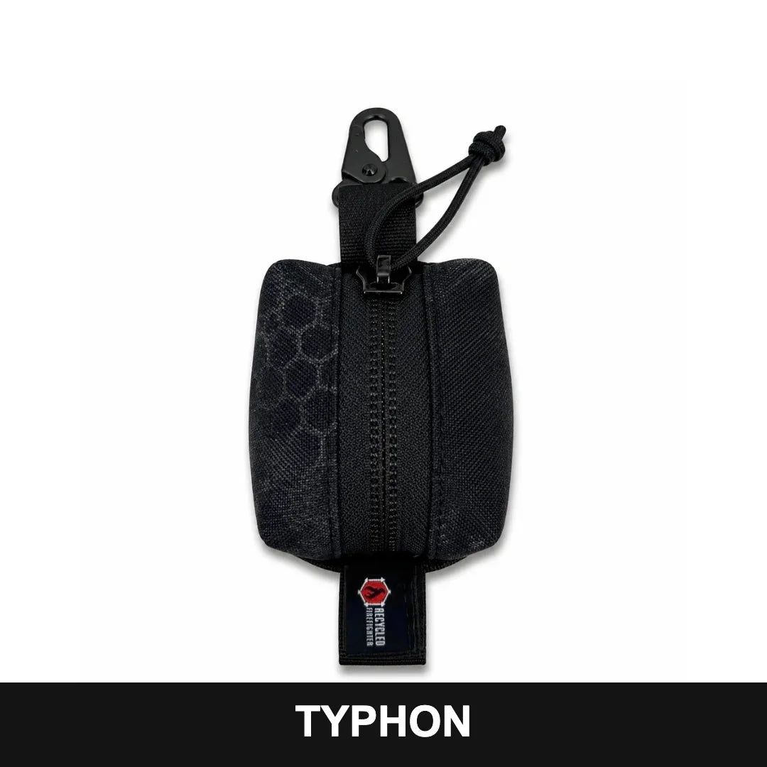 Recycled Firefighter Hot Shot Scout Keychain Pouch in Typhon camouflage, featuring a compact rugged design and secure zippered storage for small everyday carry items.