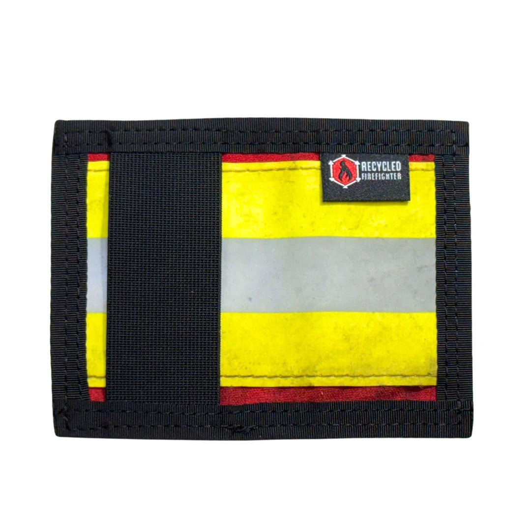 Red stripe Rookie Wallet made from bunker gear. Recycled Firefighter honors bold fire service tradition with stripe design.