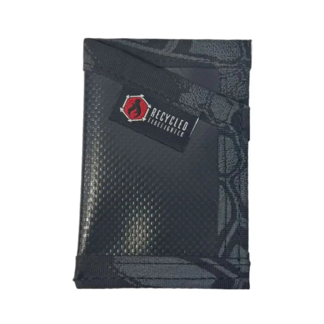 Black vinylexterior with typhon interior Sergeant Wallet. Recycled Firefighter combines understated appearance with advanced camouflage lining.