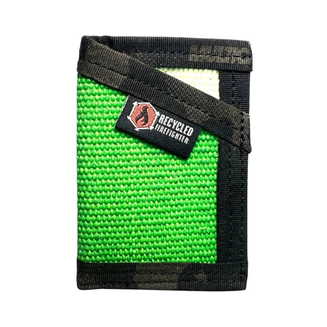 Forest green meets multicam black in this Sergeant Wallet. Recycled Firefighter's fire hose construction blends natural and tactical patterns.