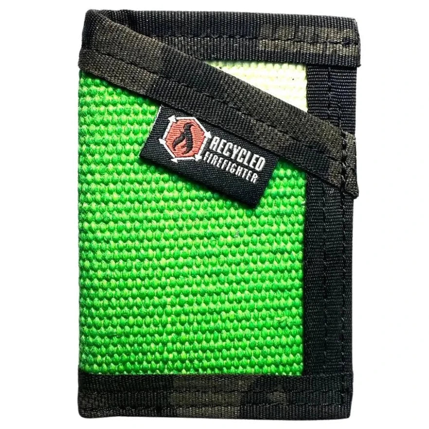 Forest green meets multicam black in this Sergeant Wallet. Recycled Firefighter's fire hose construction blends natural and tactical patterns.