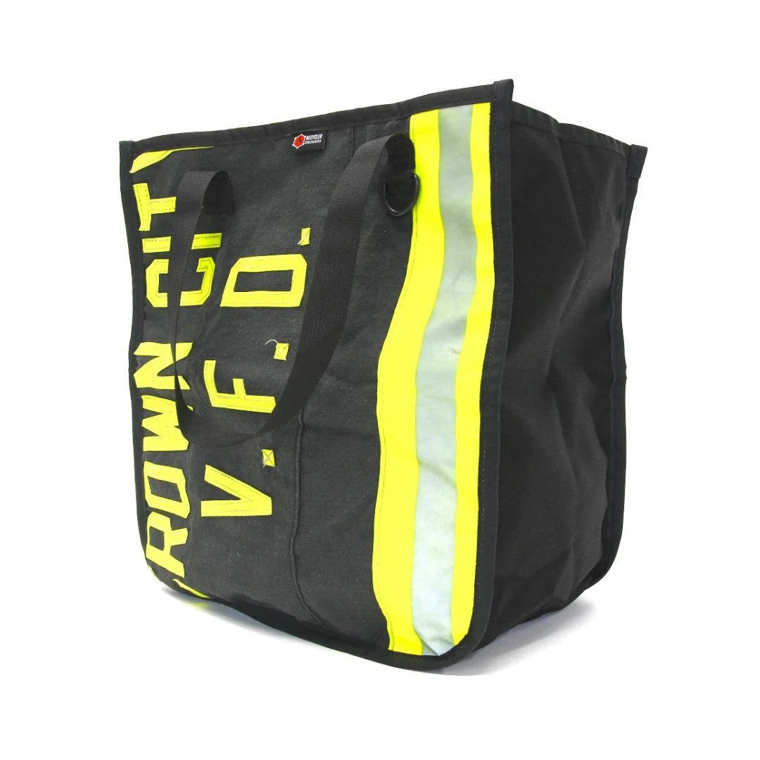 Professional The Premier Tote Bag in black bunker gear by Recycled Firefighter. Tactical design honors first responder service with quality materials.