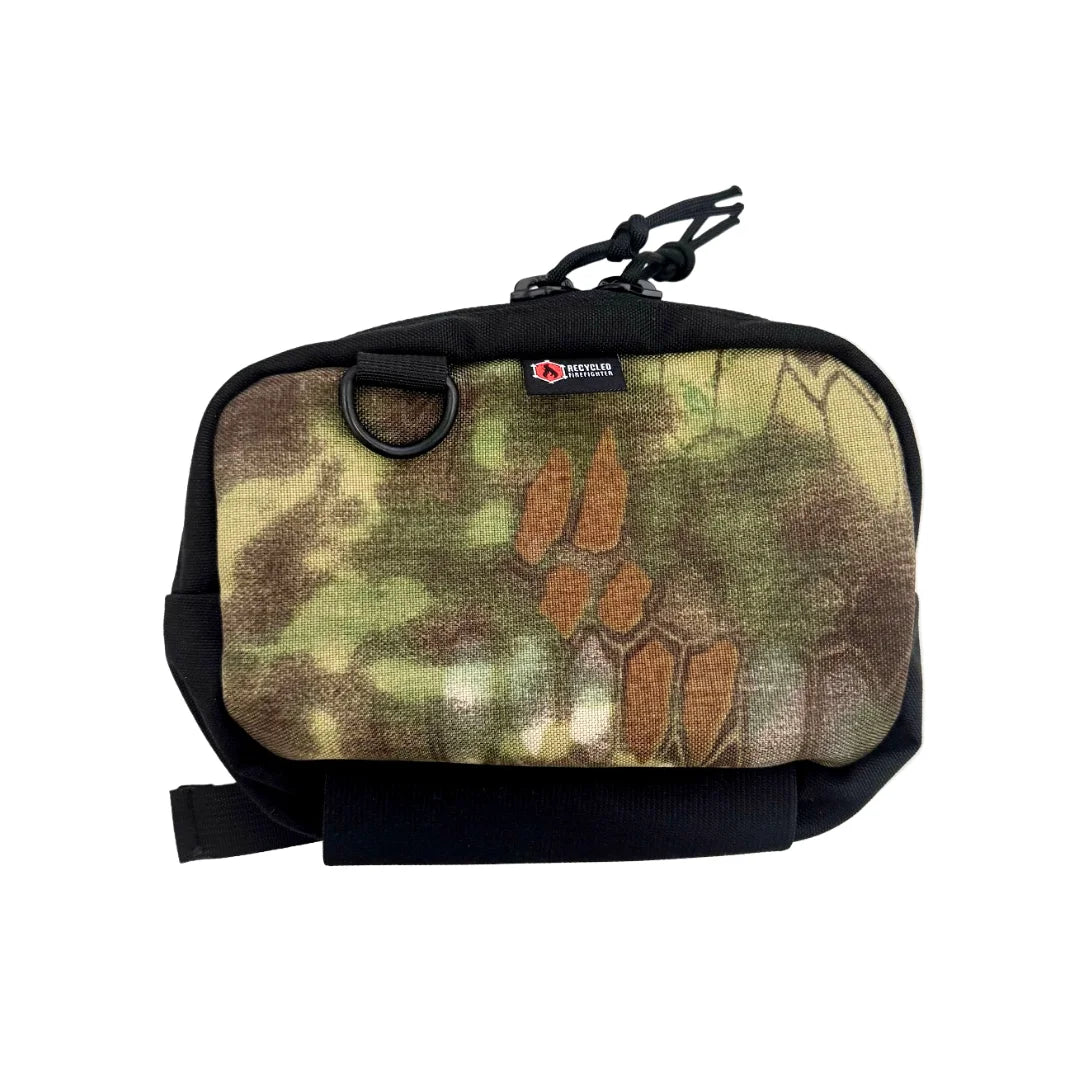 Advanced mandrake pattern TrailHound Fanny Pack from Recycled Firefighter. Dense foliage camo keeps gear accessible yet concealed.