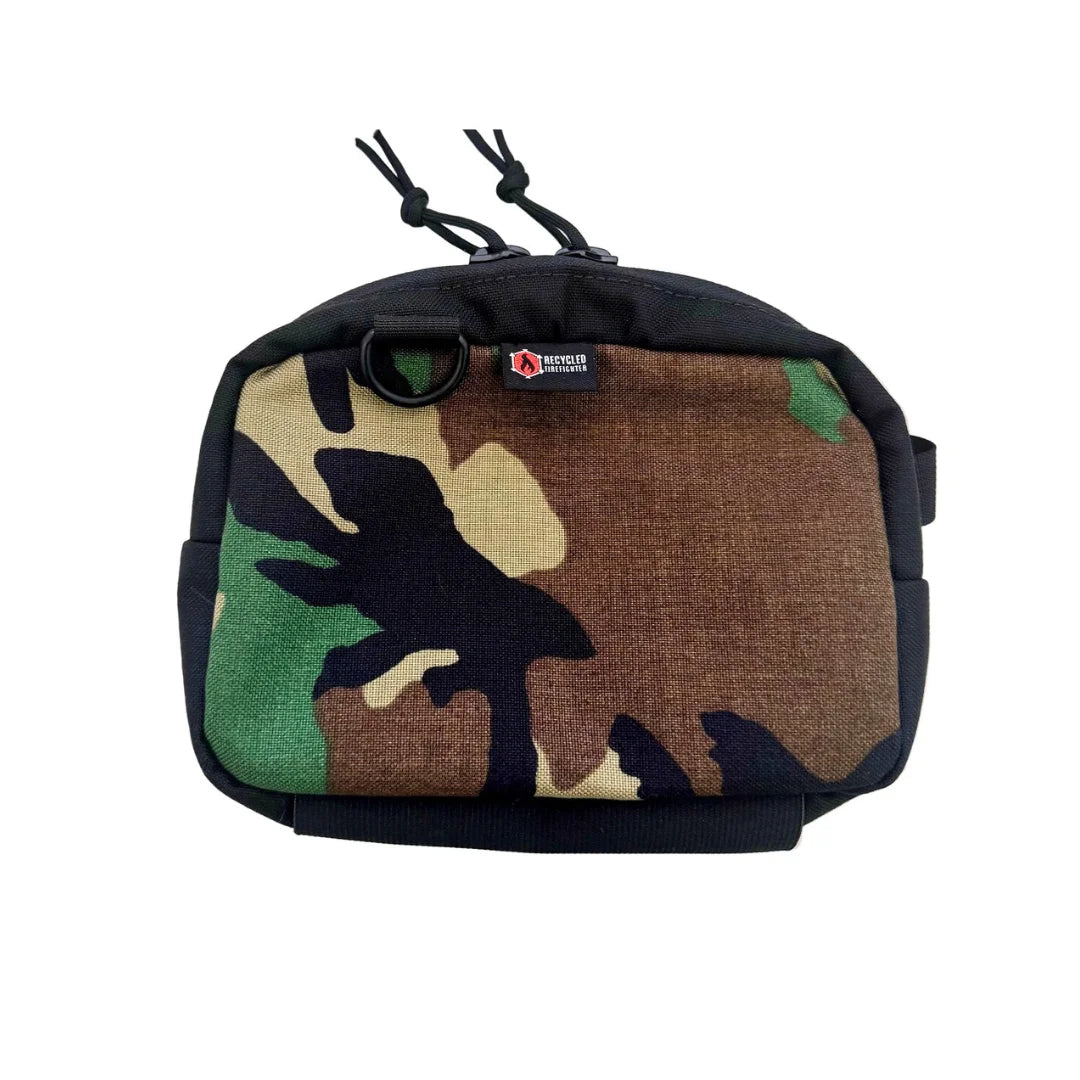 Traditional woodland camo TrailHound Fanny Pack. Recycled Firefighter's proven pattern provides hands-free tactical storage.