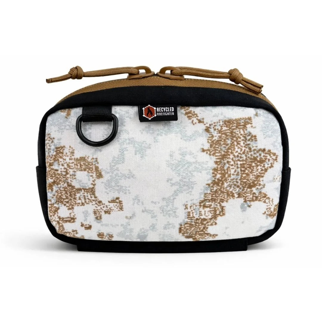 Winter snowdrift TrailHound Fanny Pack from Recycled Firefighter. Light-colored camo adapts to snow-covered environments.