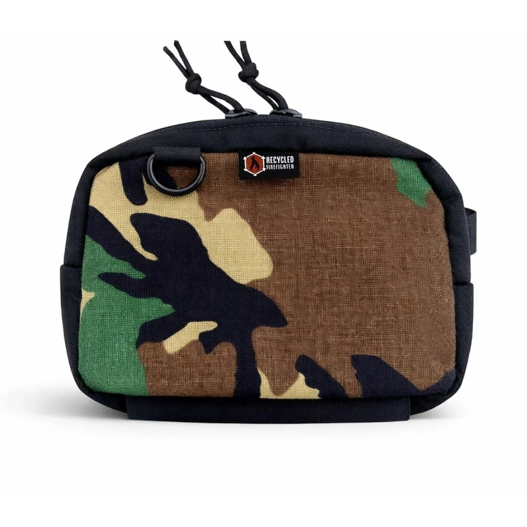 Traditional woodland camo TrailHound Fanny Pack. Recycled Firefighter's proven pattern provides hands-free tactical storage.