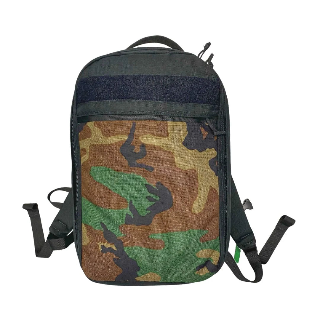 The Chief USA-made tactical backpack by Recycled Firefighter in tan featuring an integrated external front storage pocket.