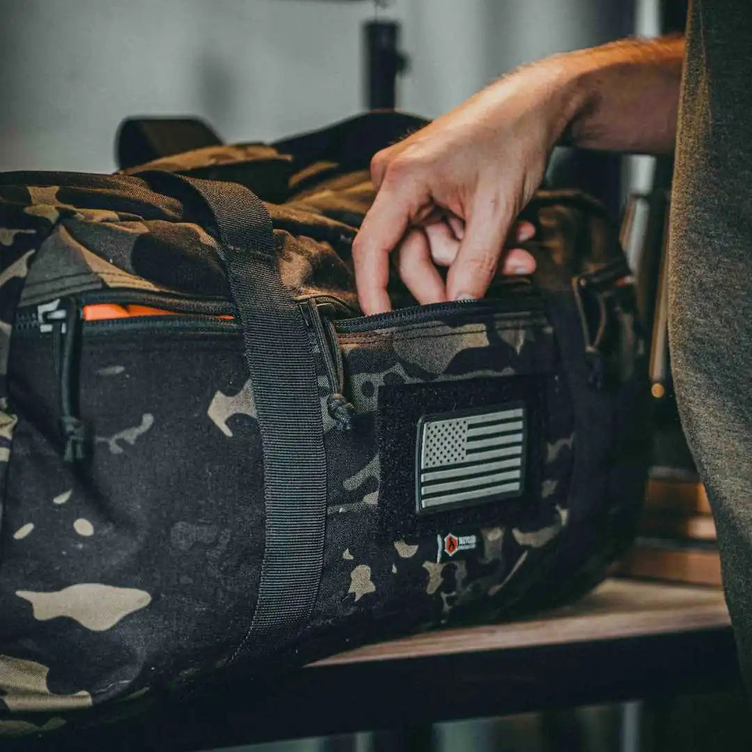 Professional 72-Hour 1000D Cordura Duffle Bag featuring mcamblk by Recycled Firefighter. Honors first responder service with durability.