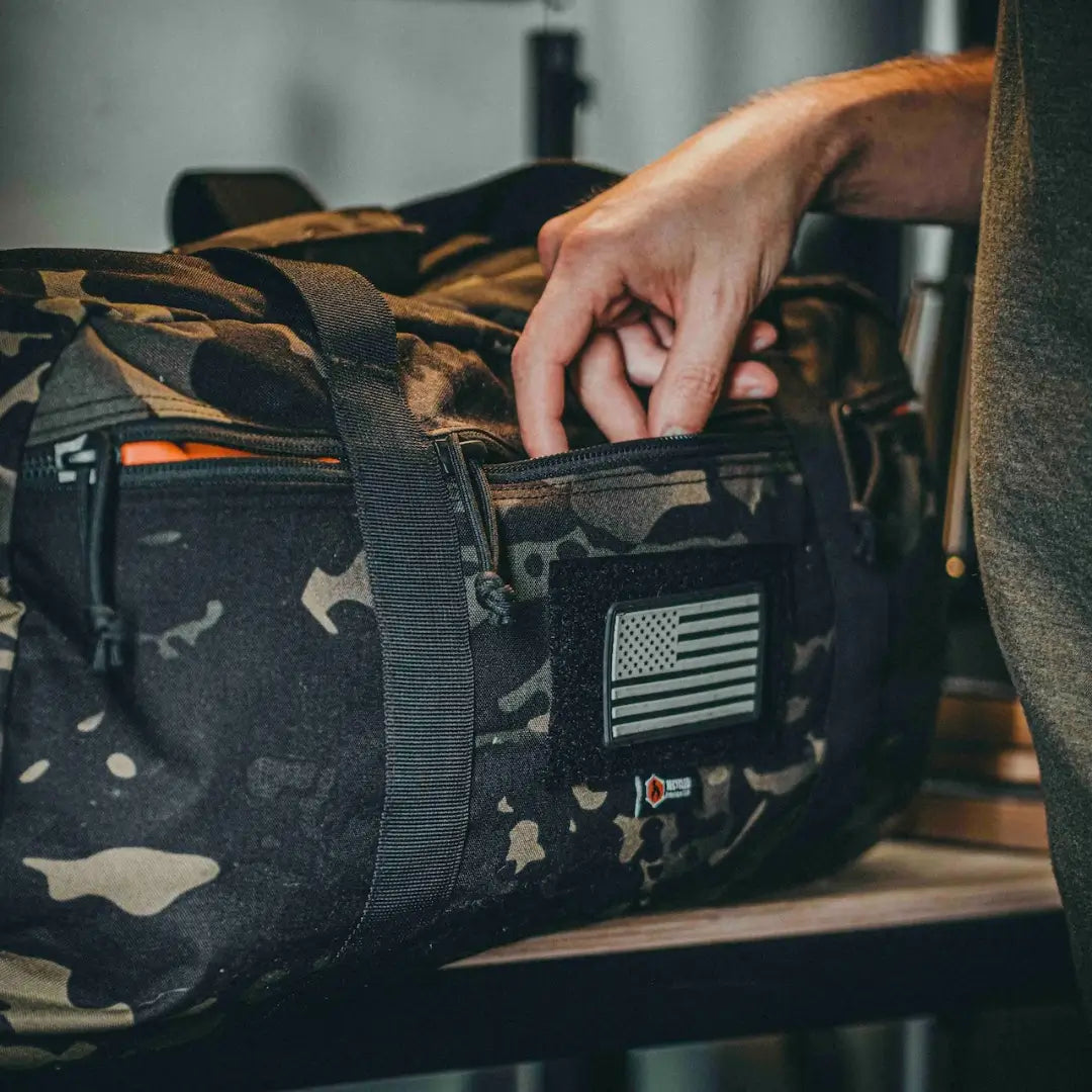 The MCAMBLK edition 72-Hour 500D Cordura Duffle Bag from Recycled Firefighter. Tactical quality designed for demanding professionals.