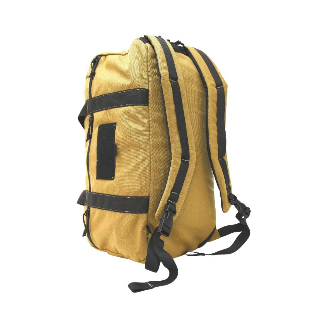 The Recycled Firefighter 72 Hour Duffle Backpack in coyote tan with black accents provides a rugged, desert-style look.