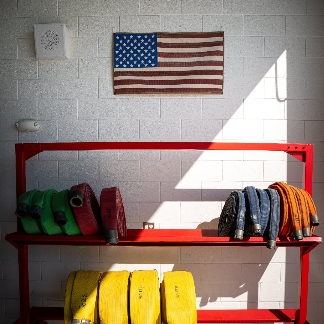 American Flag Fire Hose Vintage above the fire hose rack Recycled Firefighter