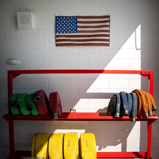 American Flag Fire Hose Vintage above the fire hose rack Recycled Firefighter