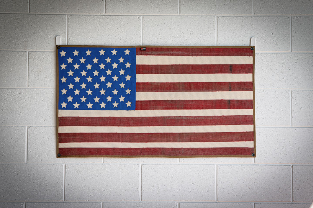 American Flag Fire Hose Vintage hanging on the bricks wall RecycledFirefighter