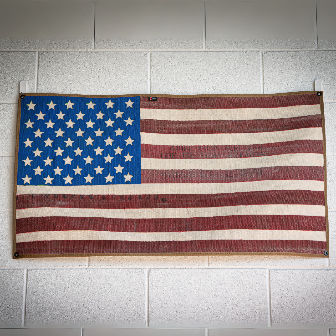 American Flag Fire Hose Vintage hanging on the brick wall RecycledFirefighter