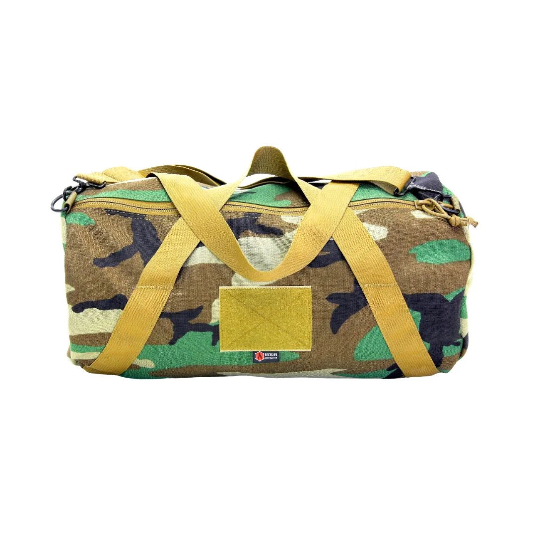 Recycled Firefighter presents the Barrel Duffle Bag 1000D in woodland. Professional design meets everyday durability.