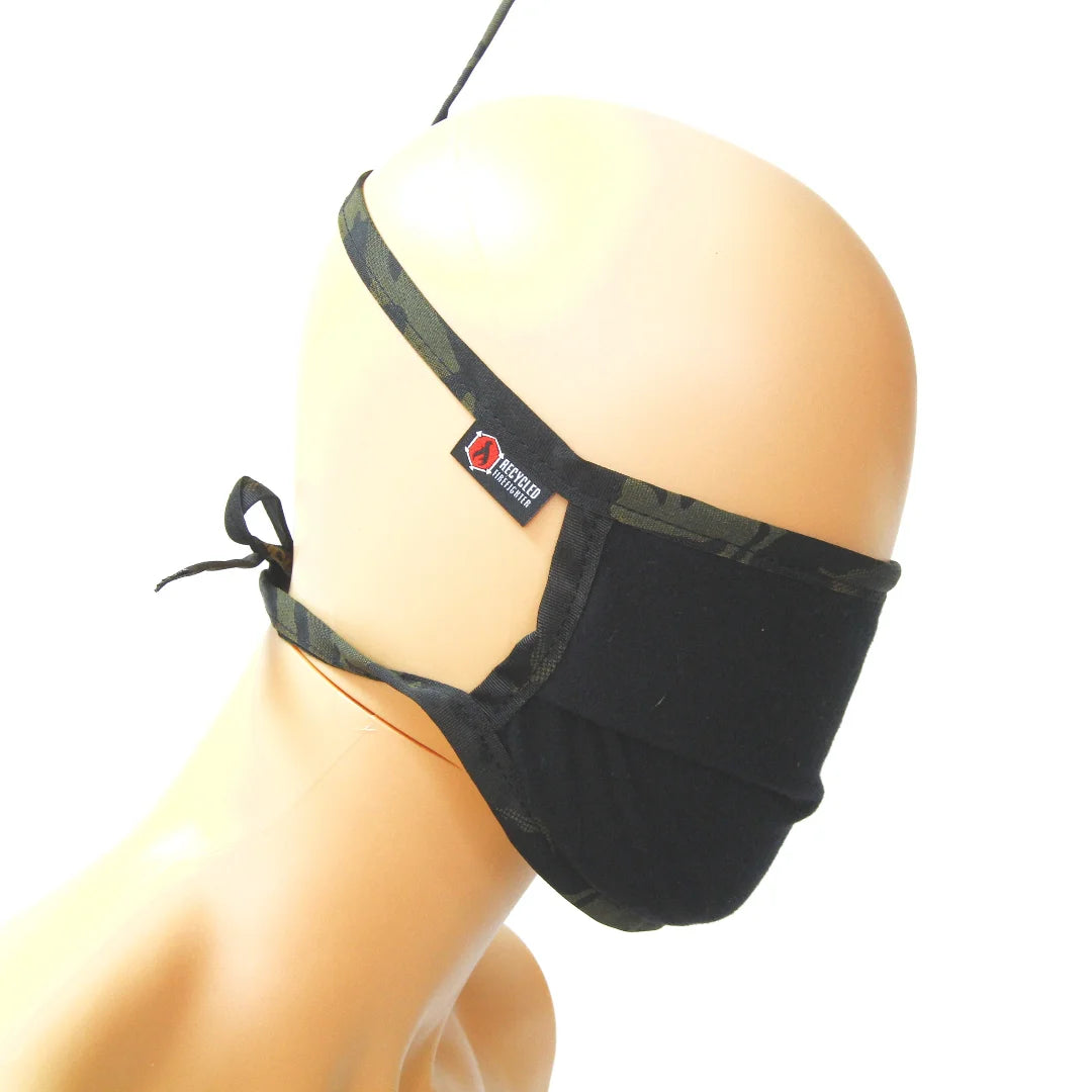 The black multicamblack Cotton Mask from Recycled Firefighter. Tactical quality meets professional design standards.