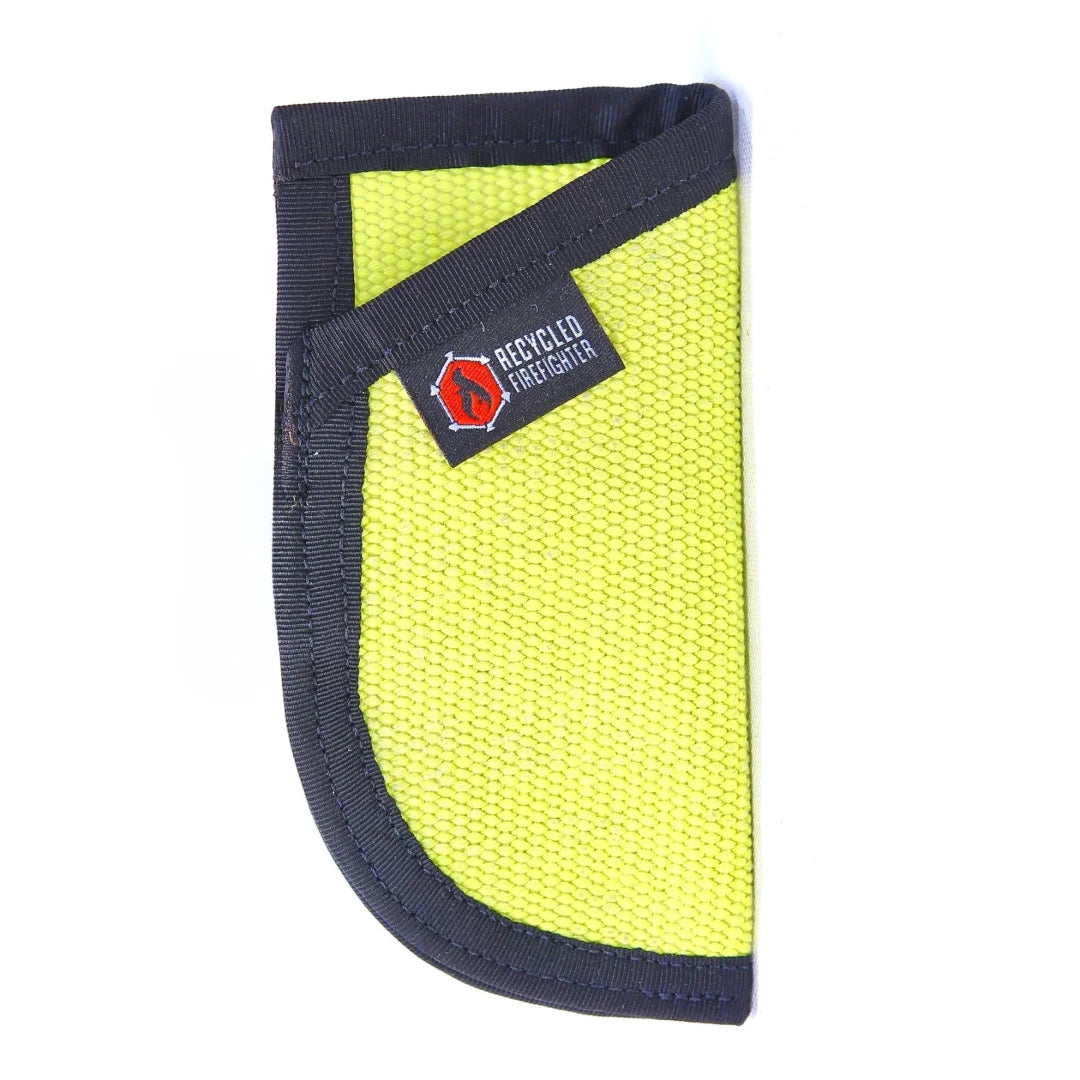 Recycled Firefighter's EDC Pocket Caddy in left yellow black hose. Built tough for demanding professional and tactical applications.