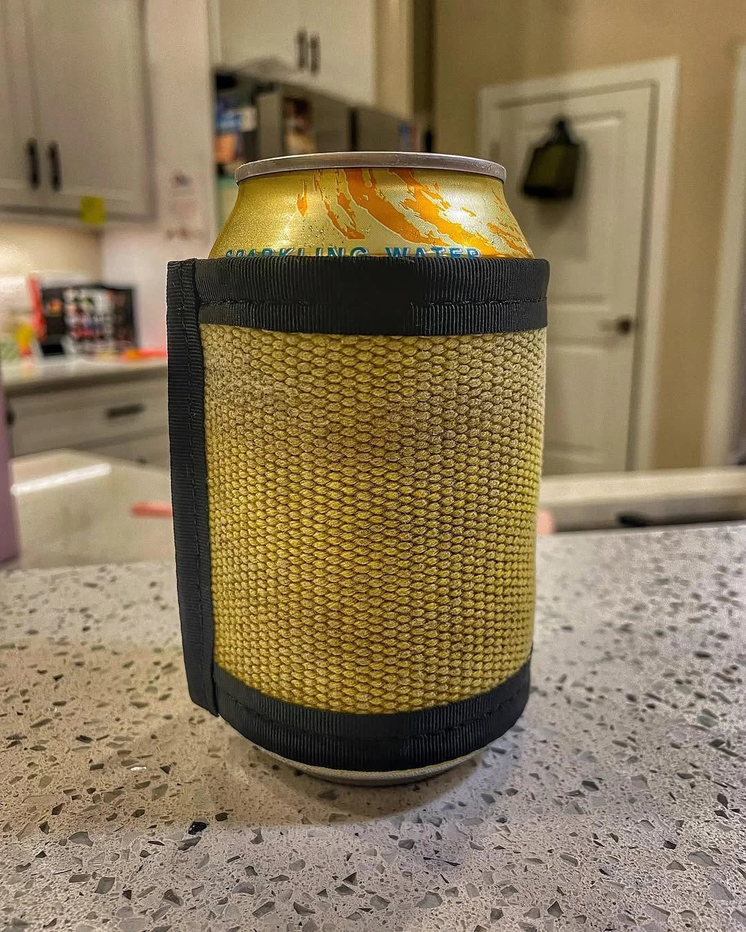 Vintage yellow drink sleeve from Recycled Firefighter. Classic fire service coloring insulates beverages with style.