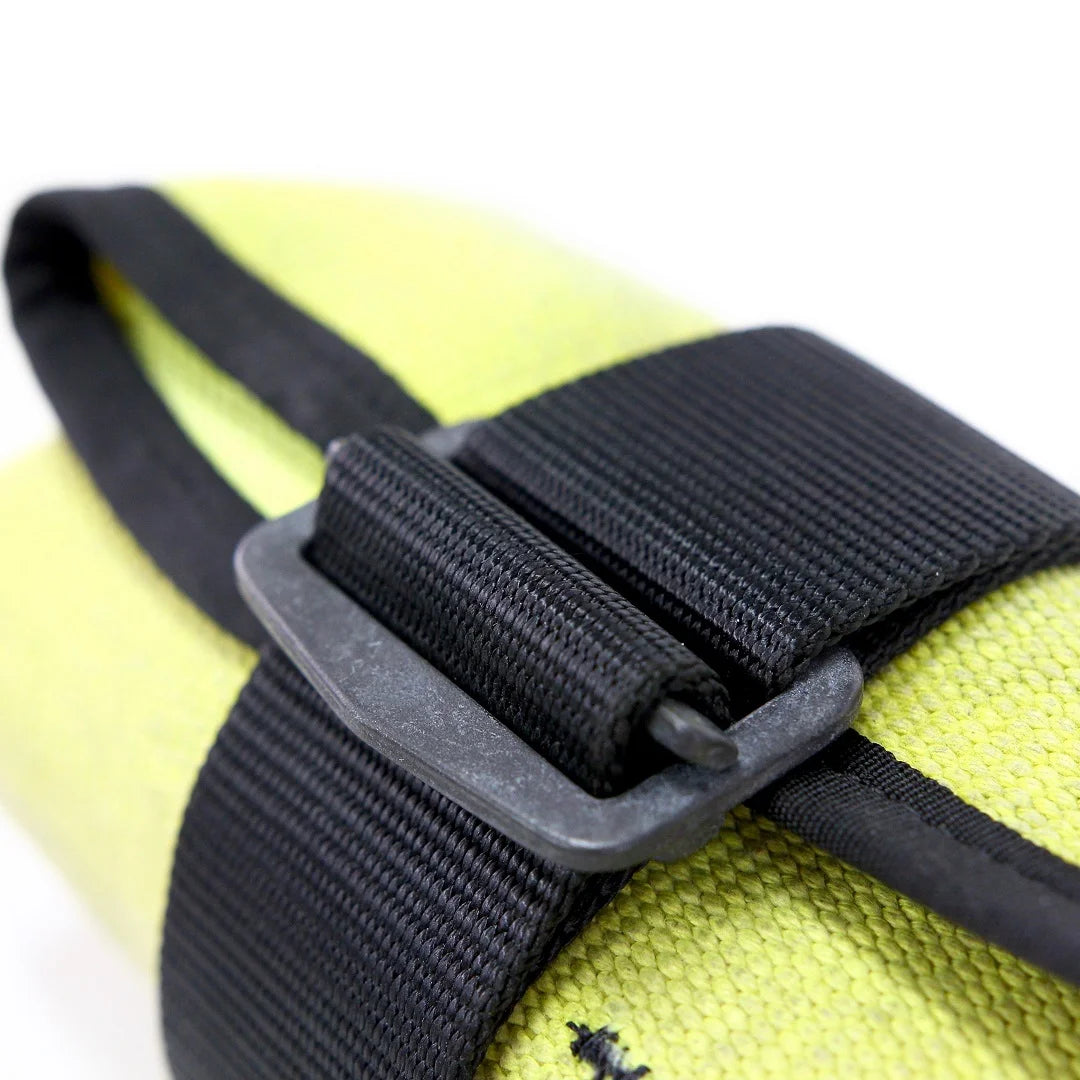 Vintage Yellow Fire Hose Tool Roll from Recycled Firefighter, showcasing the unique scuffs and character of real retired fire gear. This heavy-duty roll is box-stitched at all stress points to ensure a lifetime of reliable tool storage.