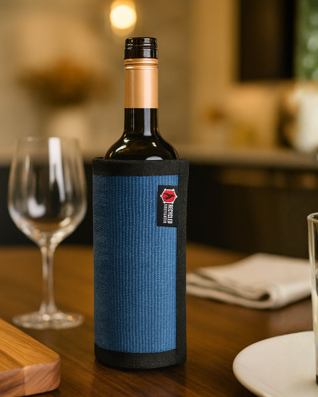 The Blue Firehose Wine Bottle Cover from Recycled Firefighter. Tactical quality meets professional design standards.