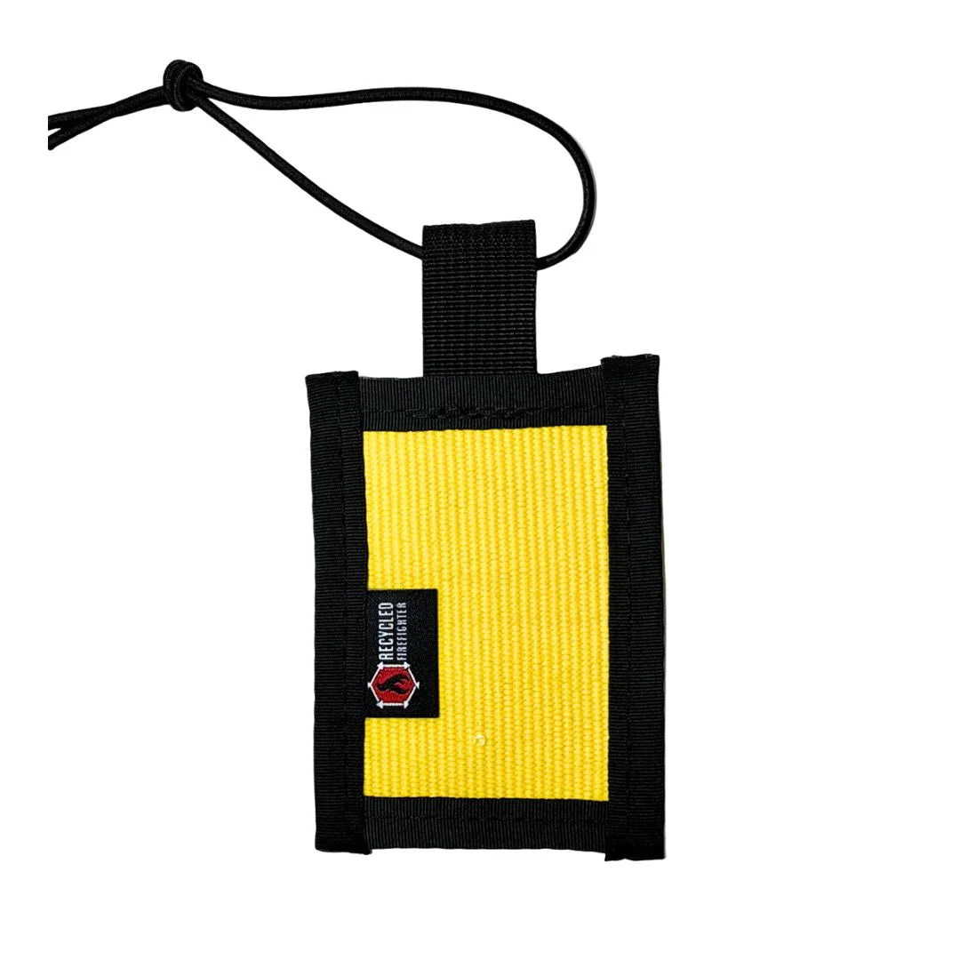 High-visibility yellow firehose luggage tag with water-resistant upcycled material and ID card slot by Recycled Firefighter.