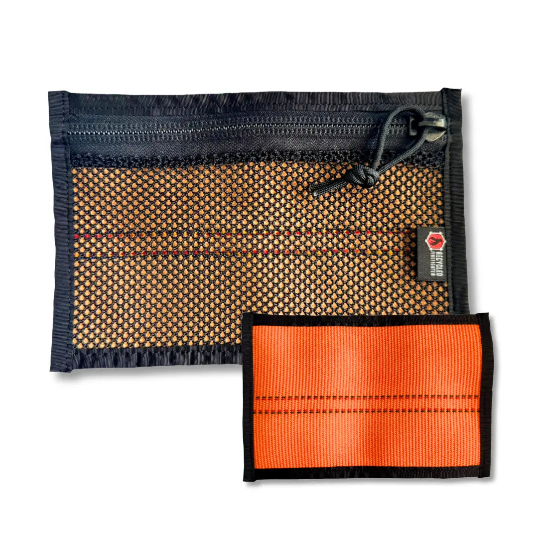 The orange & black Flat EDC Pouch Firehose by Recycled Firefighter. Quality construction meets professional tactical requirements for demanding operations.
