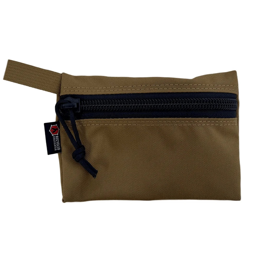The Flat Zippered Gear Pouch Medium in coyote from Recycled Firefighter. Professional-grade quality for everyday tactical use and operations.