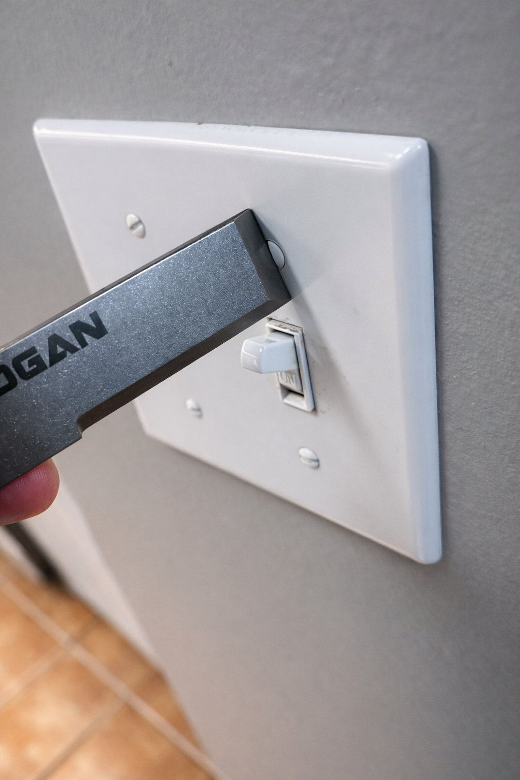 Rogan RPT pry bar in Black Oxide finish showing honest wear from use