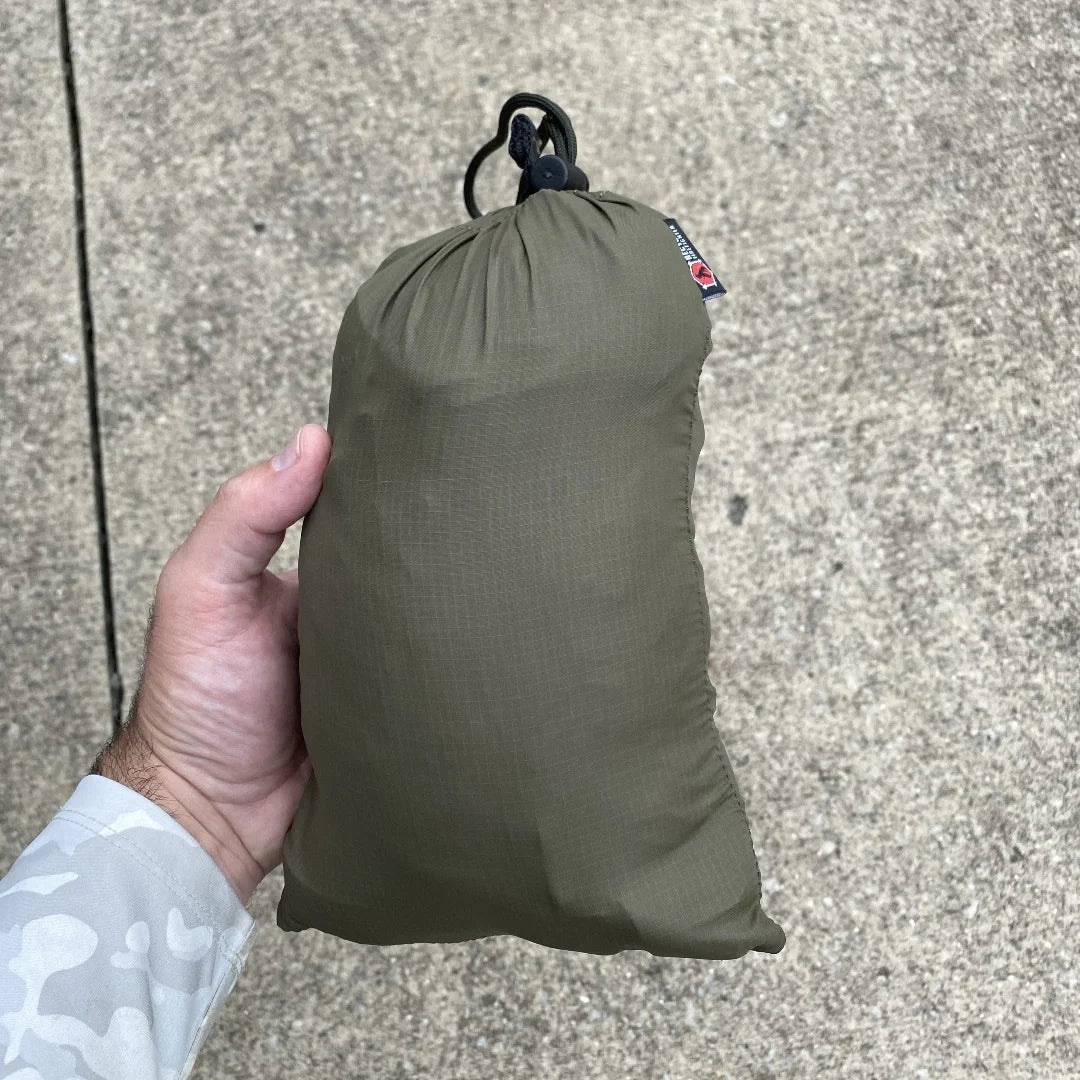 Recycled Firefighter Parachute Hammock featuring olive drab. Durable construction honors service with professional quality.