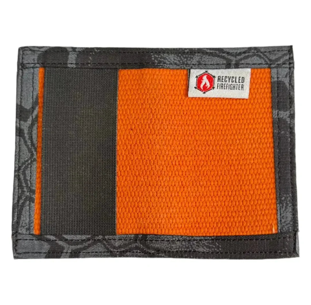 Bright orange meets typhon camo in this Rookie Wallet. Recycled Firefighter combines visibility with concealment.