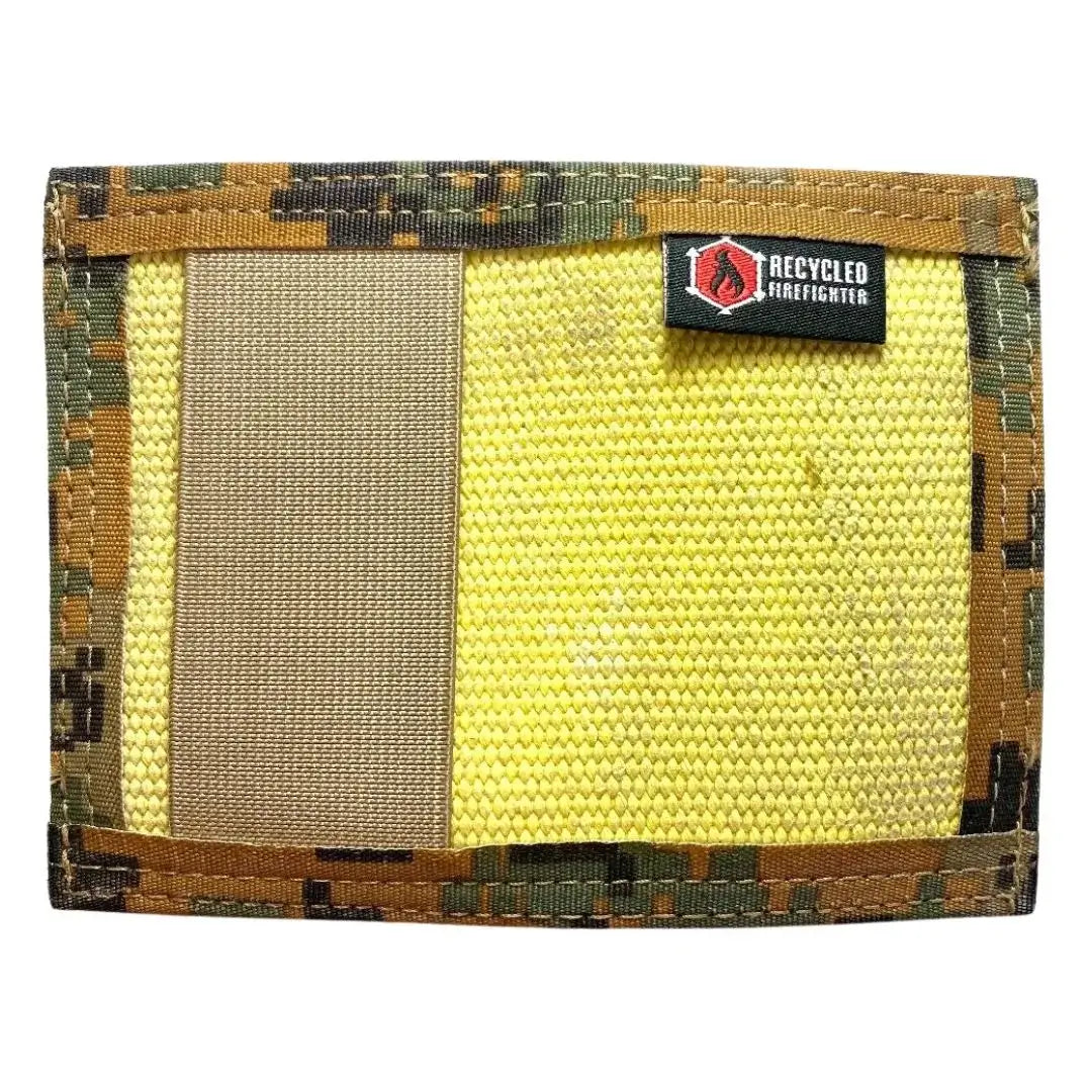 Yellow fire hose with marine Marpat Rookie Wallet by Recycled Firefighter. Honors military service branches.