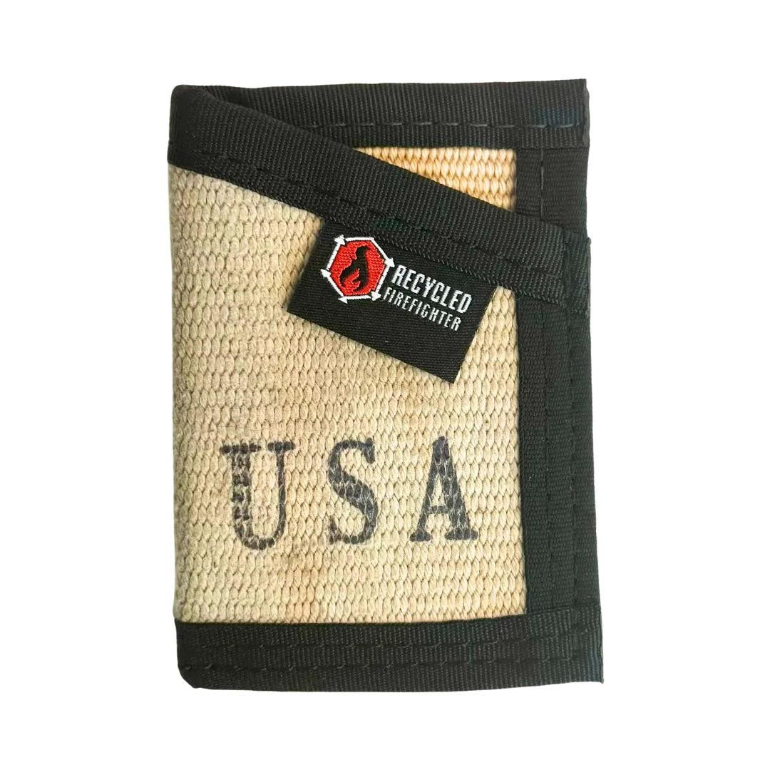 An Olive Drab Sergeant Wallet Firehose Edition by Recycled Firefighter constructed with a black strap for a military-inspired look.