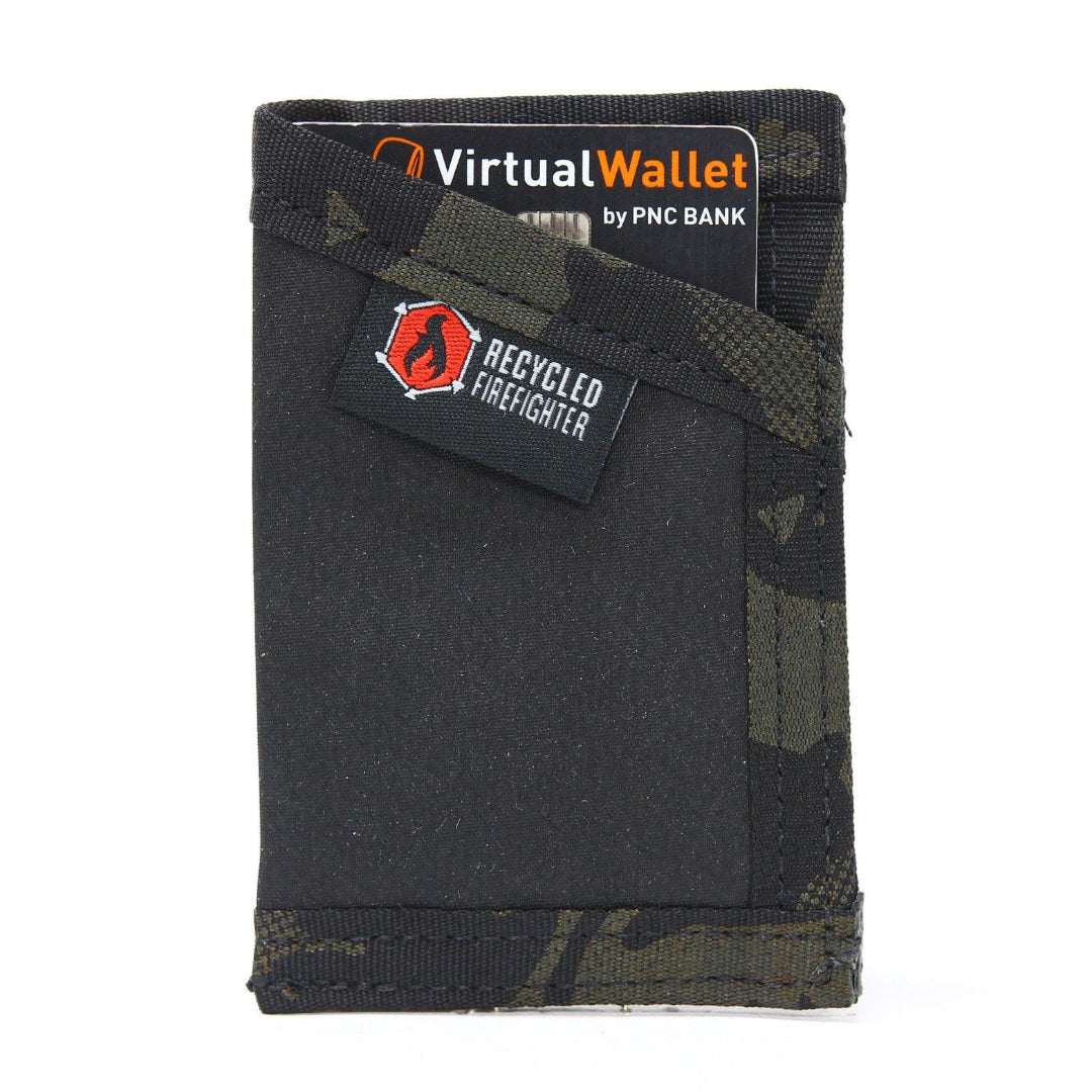 All-black Sergeant Hypalon Wallet by Recycled Firefighter. Weather-resistant construction protects contents during harsh conditions.