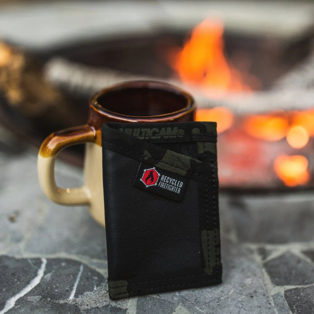 Black and multicam black Sergeant Hypalon Wallet from Recycled Firefighter. Water-resistant design maintains tactical appearance.