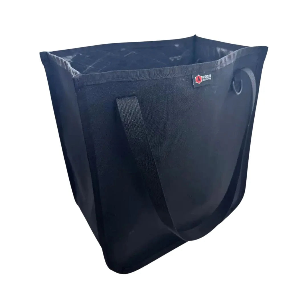 Professional The Tactical Tote Bag featuring xpac black out by Recycled Firefighter. Honors first responder service with durability.