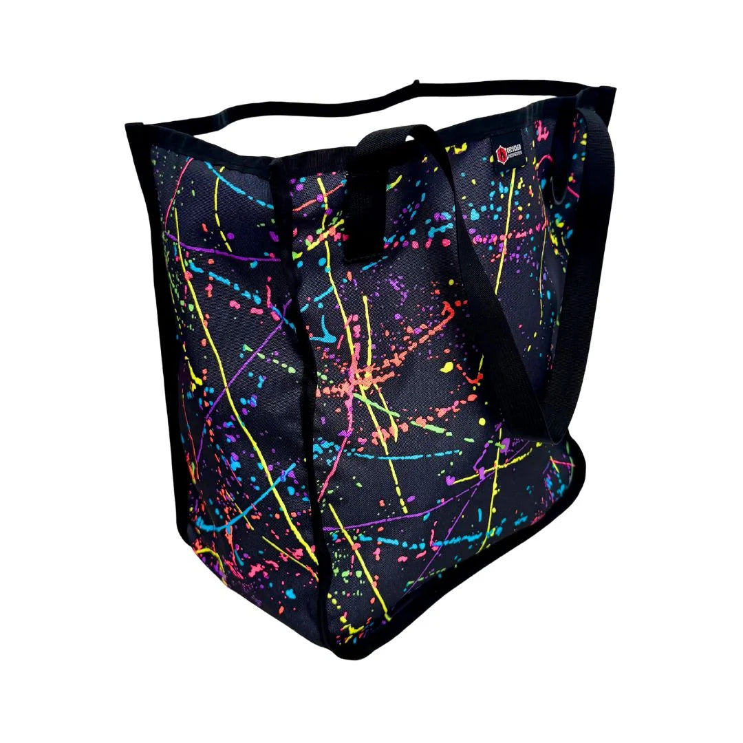 Professional The Tactical Tote Bag in splatter by Recycled Firefighter. Tactical design honors first responder service with quality materials.