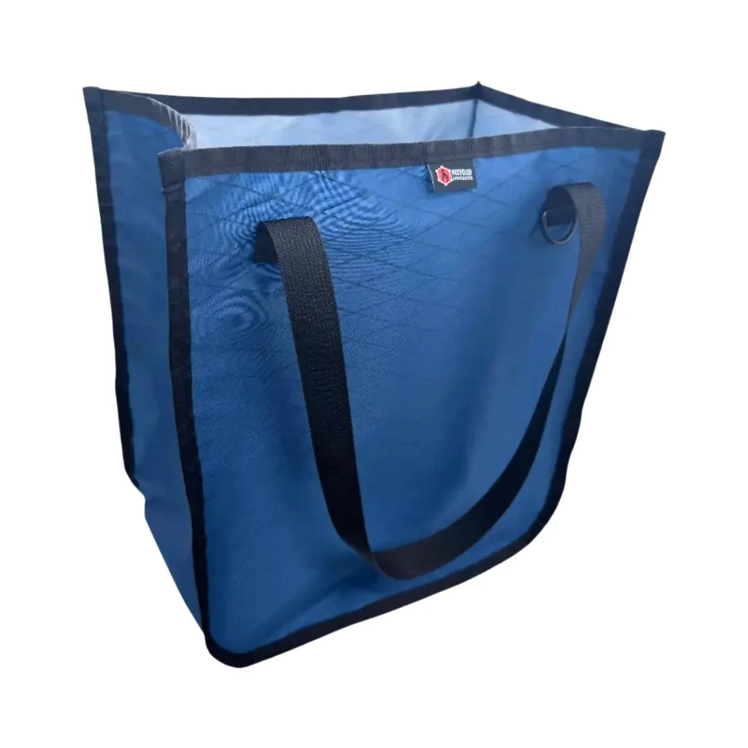 The Tactical Tote Bag in xpac blue ice by Recycled Firefighter. Durable professional gear for tactical applications.
