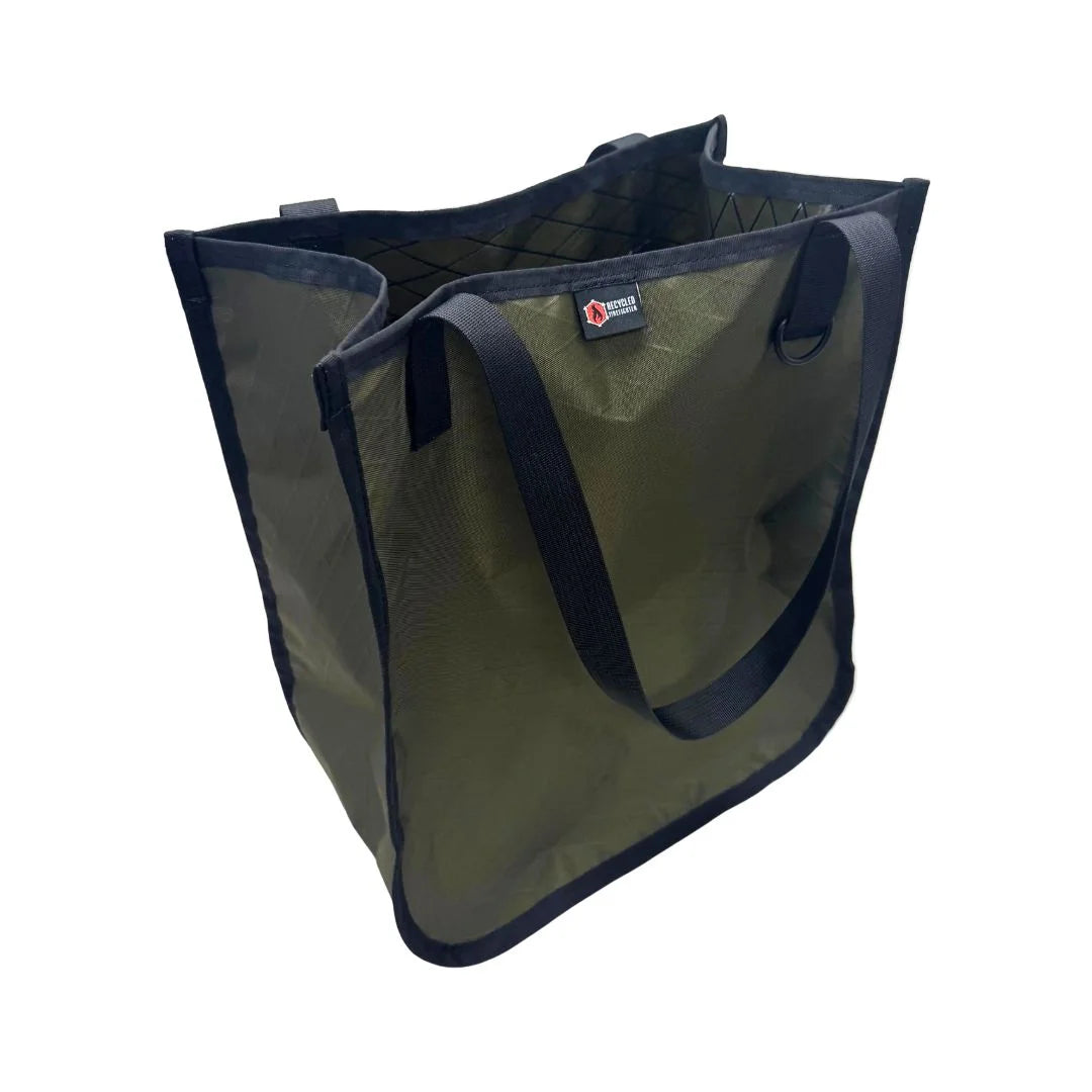 Recycled Firefighter The Tactical Tote Bag in xpac olive drab. Professional tactical design built for durability and daily use by first responders.