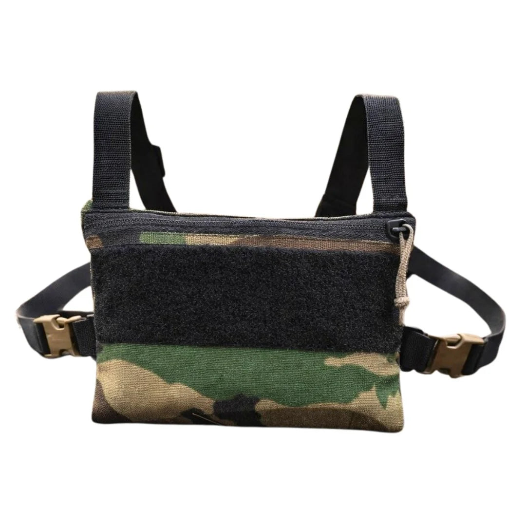 Woodland Minimalist Chest Rig in Woodland Minimalist Chest Rig by Recycled Firefighter. Durable professional gear for tactical applications.