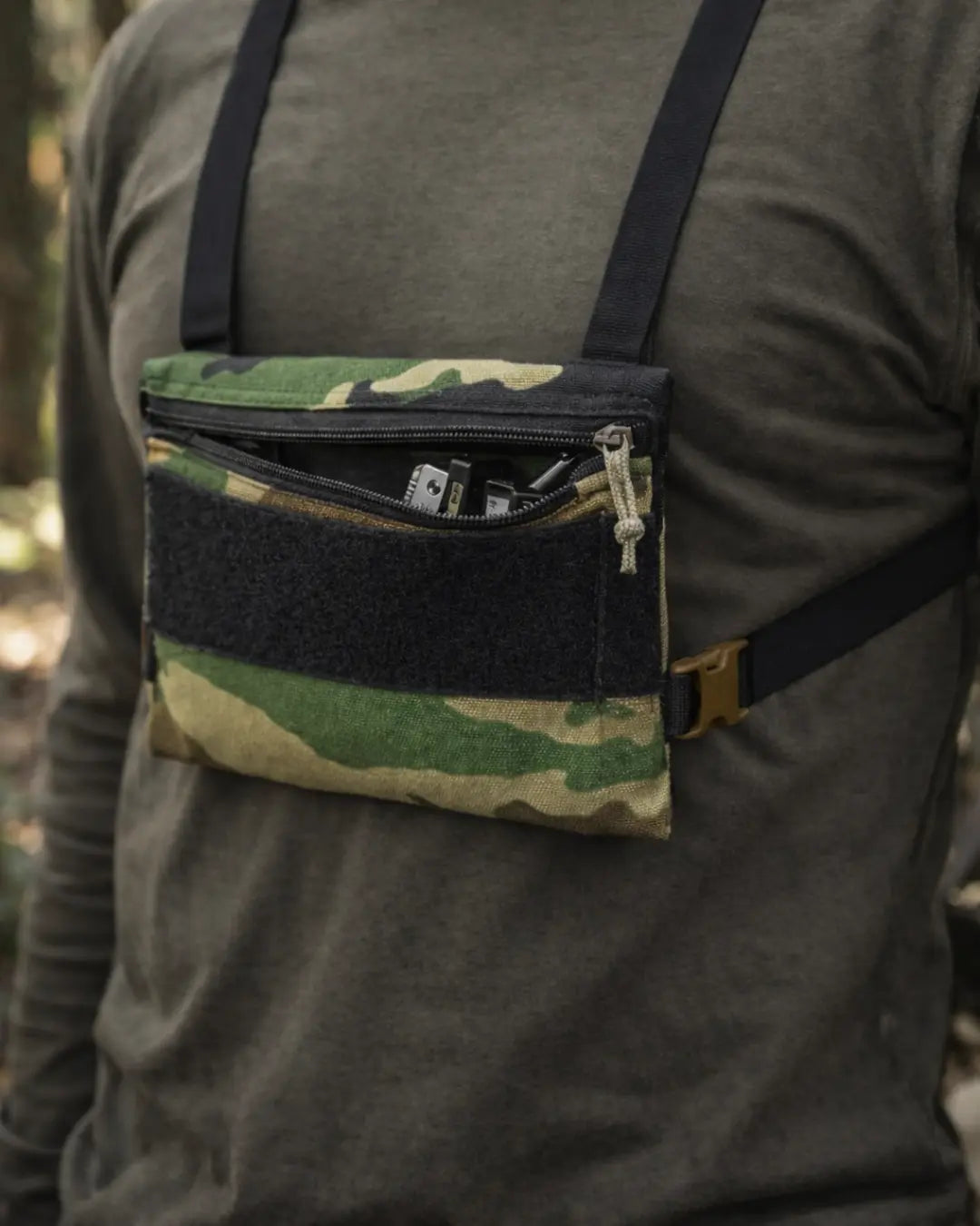 Woodland Minimalist Chest Rig in Woodland Minimalist Chest Rig by Recycled Firefighter. Durable professional gear for tactical applications.