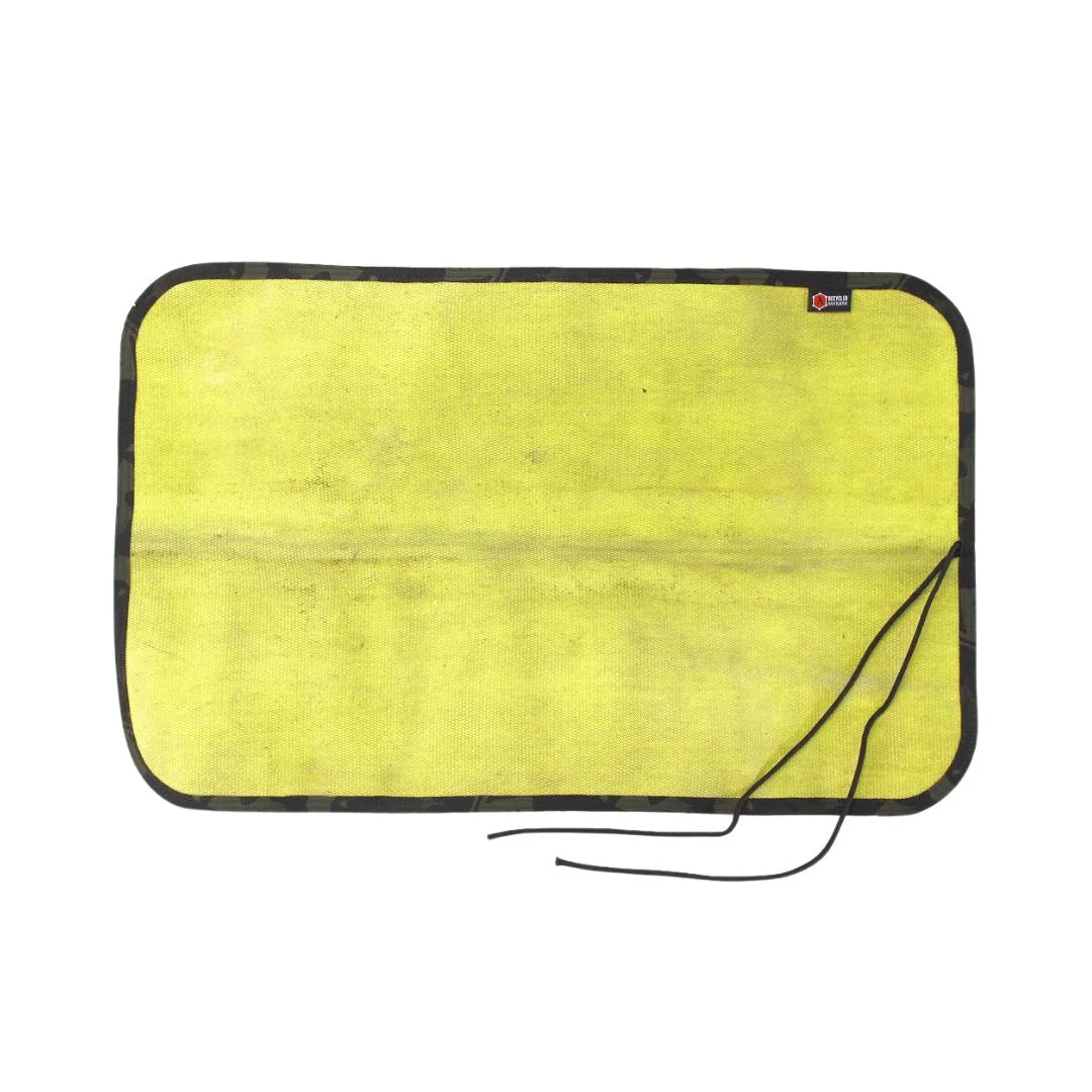 Yellow Black Variant A rugged Yellow Black Drop Zone Mat from Recycled Firefighter featuring a yellow repurposed firehose surface and black 1000D nylon backing. The mat is laid flat to provide a durable workspace for cleaning tools or organizing gear.
