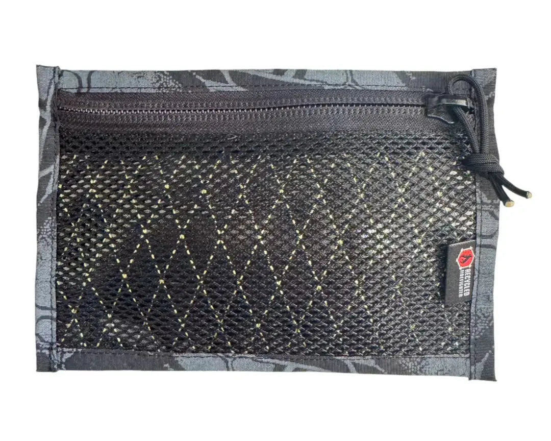 The Flat EDC Pouch X-Pac RAID in Xpac raid & Typhon by Recycled Firefighter. Tactical design meets professional durability standards.