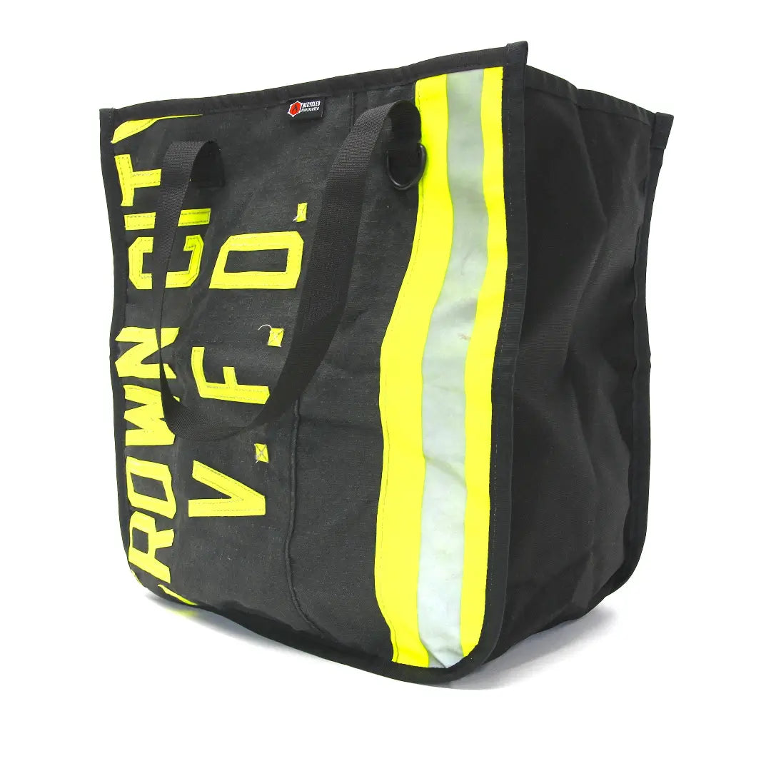 Professional The Premier Tote Bag in black bunker gear by Recycled Firefighter. Tactical design honors first responder service with quality materials.