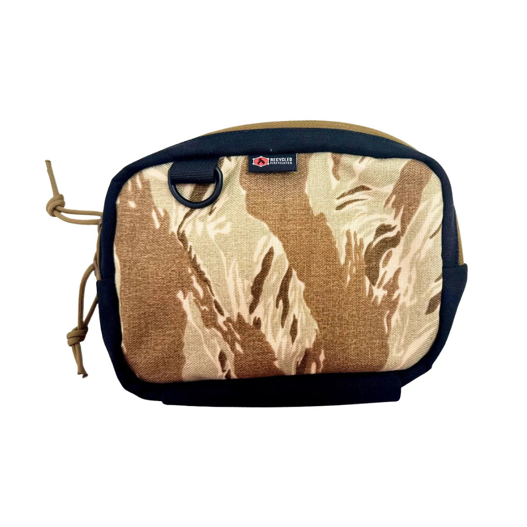 Desert tigerstripe TrailHound Fanny Pack from Recycled Firefighter. Arid environment camo organizes essentials for quick waist-level access.