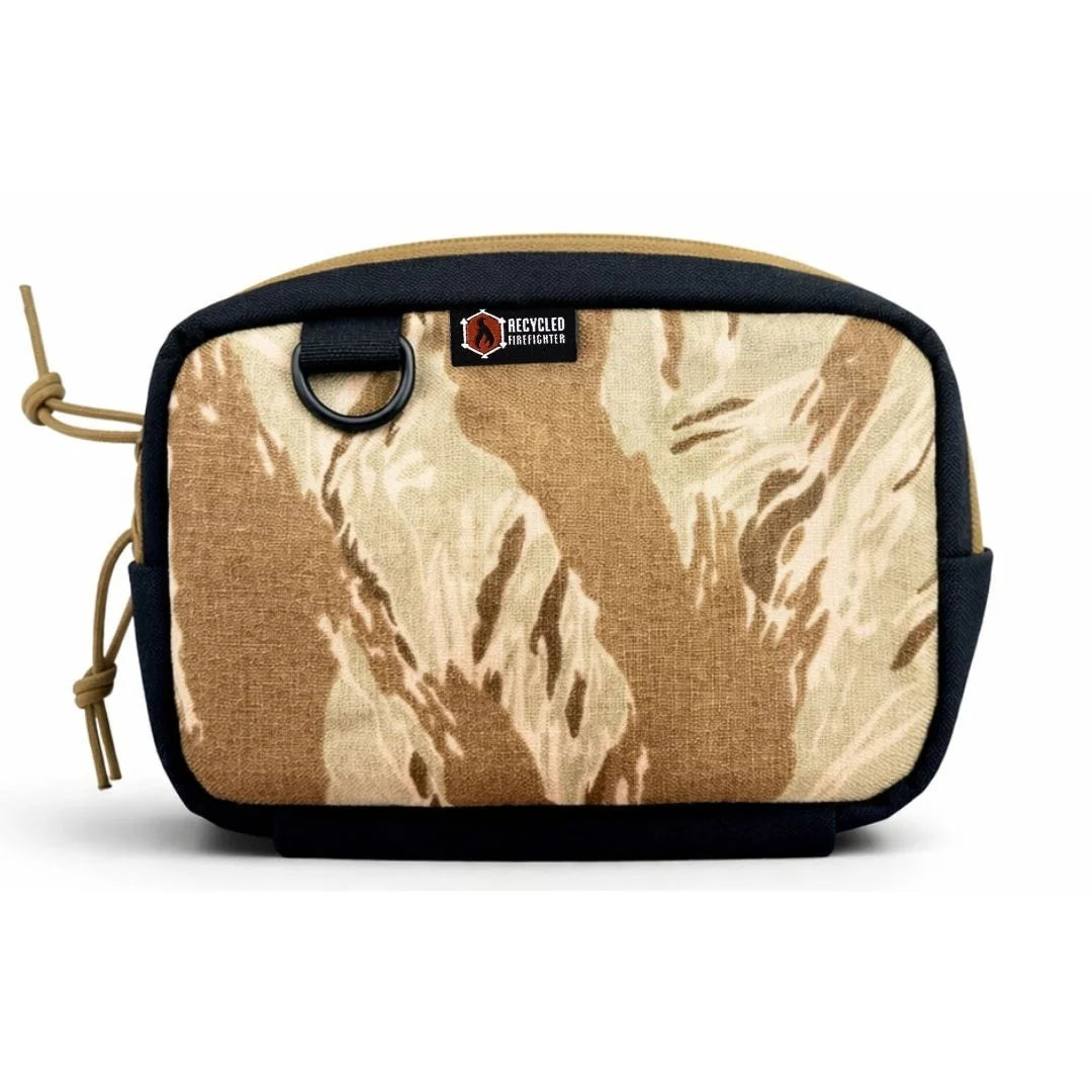 Desert tigerstripe TrailHound Fanny Pack from Recycled Firefighter. Arid environment camo organizes essentials for quick waist-level access.